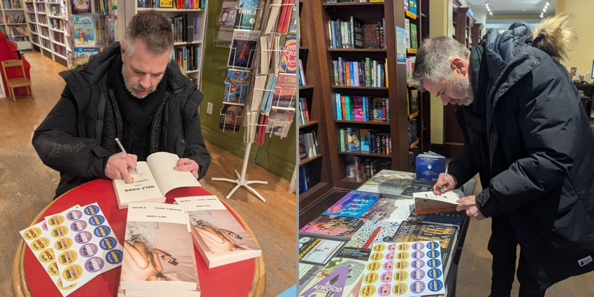 Russell autographing books in two bookstores (while wearing black MEC parka)